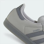 Close-up of the forefoot area, highlighting the precision stitching and the contrast between the leather and suede materials.