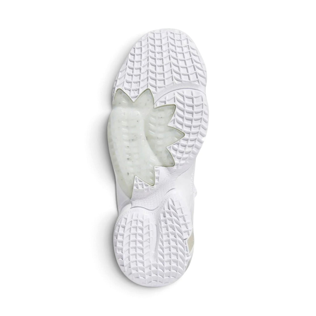 Bottom view of the robust rubber outsole with multi-directional traction patterns designed for exceptional grip on the court.