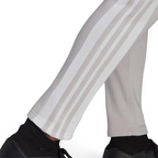 Zoom looking at the open hem cuffs and 3 stripes design