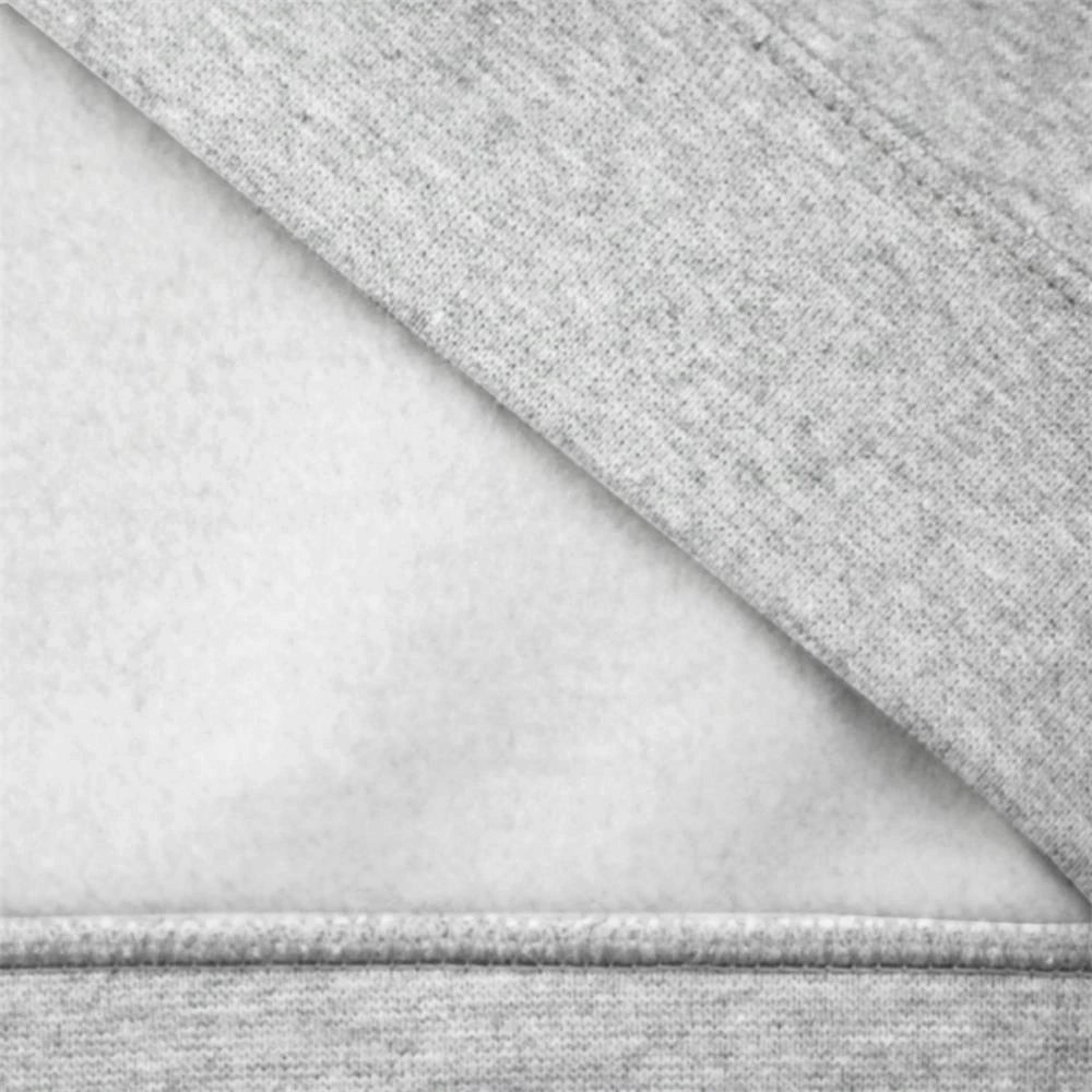 Outsole view of the interior fleece lining, detailing the brushed texture and the recycled material tags.