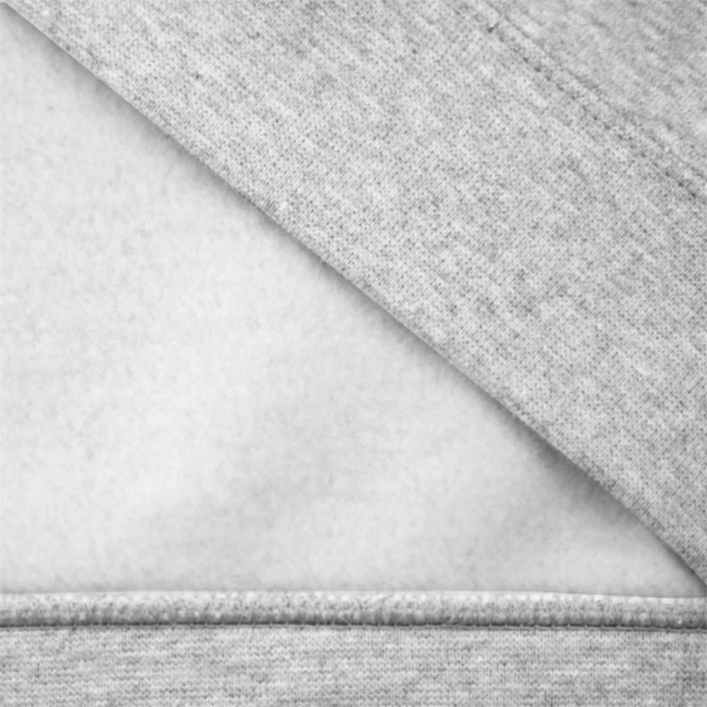 Outsole view of the interior fleece lining, detailing the brushed texture and the recycled material tags.