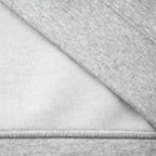Outsole view of the interior fleece lining, detailing the brushed texture and the recycled material tags.