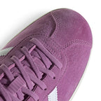 Details the micro-precision of the forefoot area, showing the buttery nap of the Preloved Purple suede T-toe mudguard, flat woven laces, and supple unpadded tongue construction.