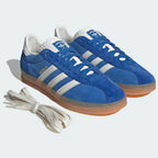 Angle View Showing Both Pair Side by Side: Emphasizing the T-toe overlay and the contrast between the two shades of blue.
