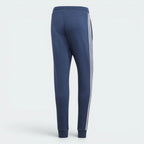 Focuses on the clean lines of the tapered legs and the professional finish of the fleece material.