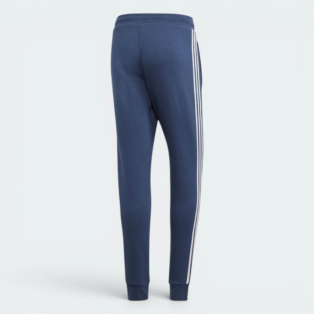Focuses on the clean lines of the tapered legs and the professional finish of the fleece material.