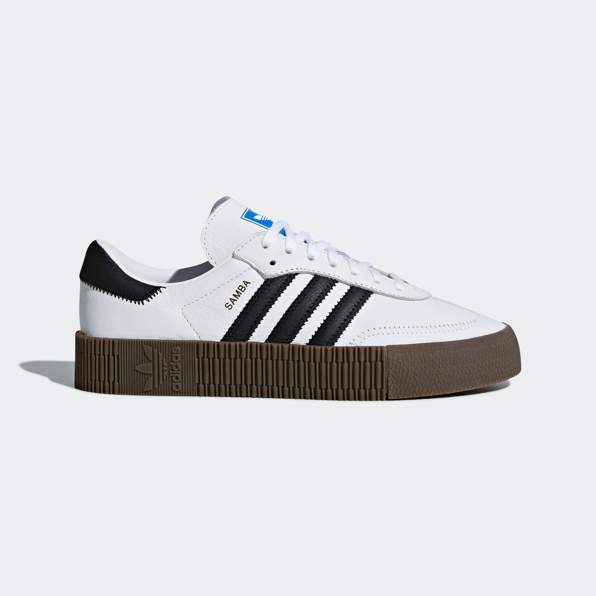 Highlights the thick platform gum outsole and the professional contrast of the black 3-Stripes against white grain leather.
