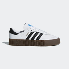 Highlights the thick platform gum outsole and the professional contrast of the black 3-Stripes against white grain leather.