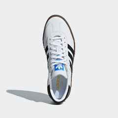 Focuses on the "locked-in" lacing system and the iconic blue rectangle Trefoil badge on the tongue.