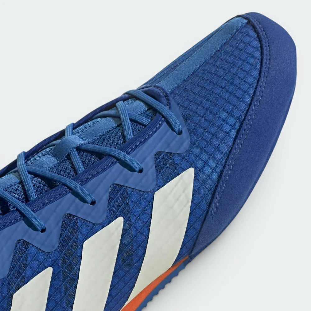 Details the high-definition mesh weave and the precision of the red detailing.
