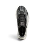 Overhead view looking down at the laced running shoes, displaying the black flat laces, co-branded Stella McCartney tongue badge, and streamlined collar opening.