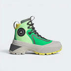 Highlights the high-velocity Solar Lime colour palette, the printed structural overlays, and the professional depth of the thick, rugged midsole.