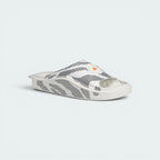 Emphasising the low-profile designer stance and the professional harmony of the fabric strap textures.