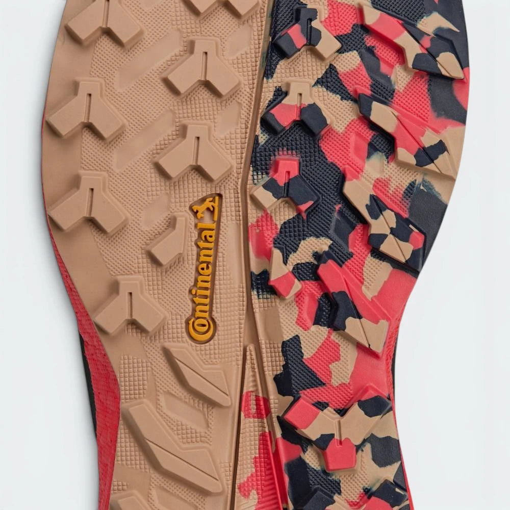 Close-up of shoe soles with Continental logo on a light gray background