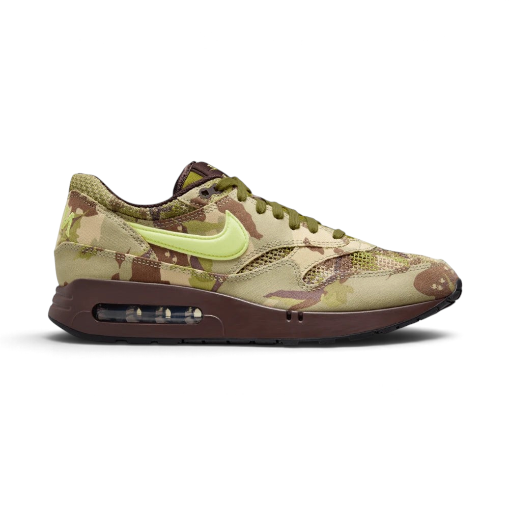 Highlights the high-velocity sweep of the contrasting Oil Green suede Swoosh, showing the professional, multi-textured panels of the Earth brown mesh, the prominent white midsole, and the legendary four-window Big Bubble heel unit.