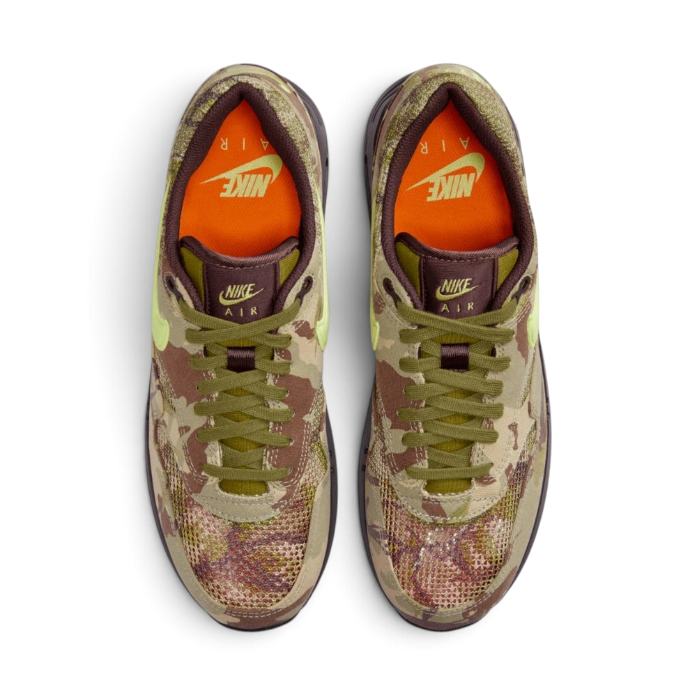 Focuses on the locked-in traditional lacing layout, displaying the perfect symmetry of the sail laces, the Earth brown mesh tongue, and the vibrant Light Lemon Twist logo branding printed on the insoles.
