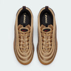Focuses on the locked-in hidden lacing layout, the clean alignment of the gold mesh tongue, and the symmetrical sweep of the piping guarding the front box.