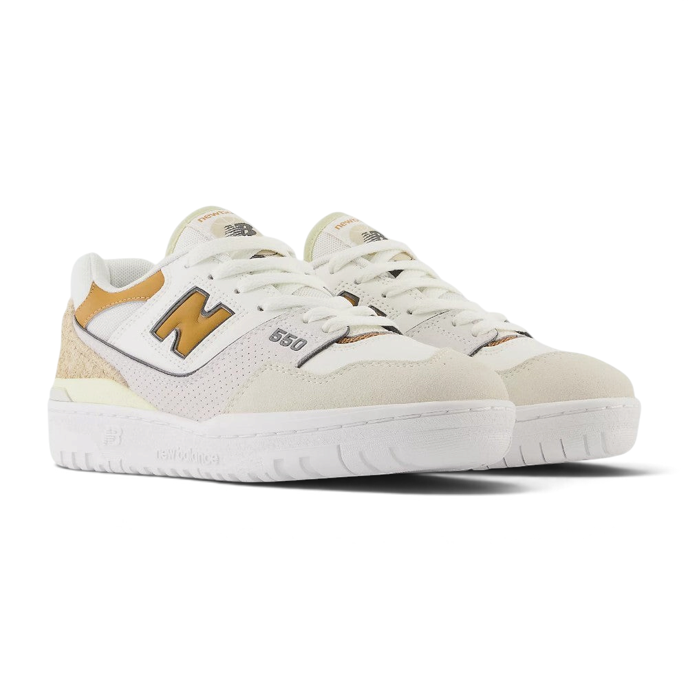 Emphasising the low-cut, athletic basketball stance of the trainers and the harmonious contrast between the smooth white leather, sea salt suede, and tobacco branding hits.