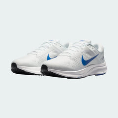 Angled view of two Nike Air Zoom Structure 24 Men's white running shoes, side by side, showcasing their responsive design and stable profile.