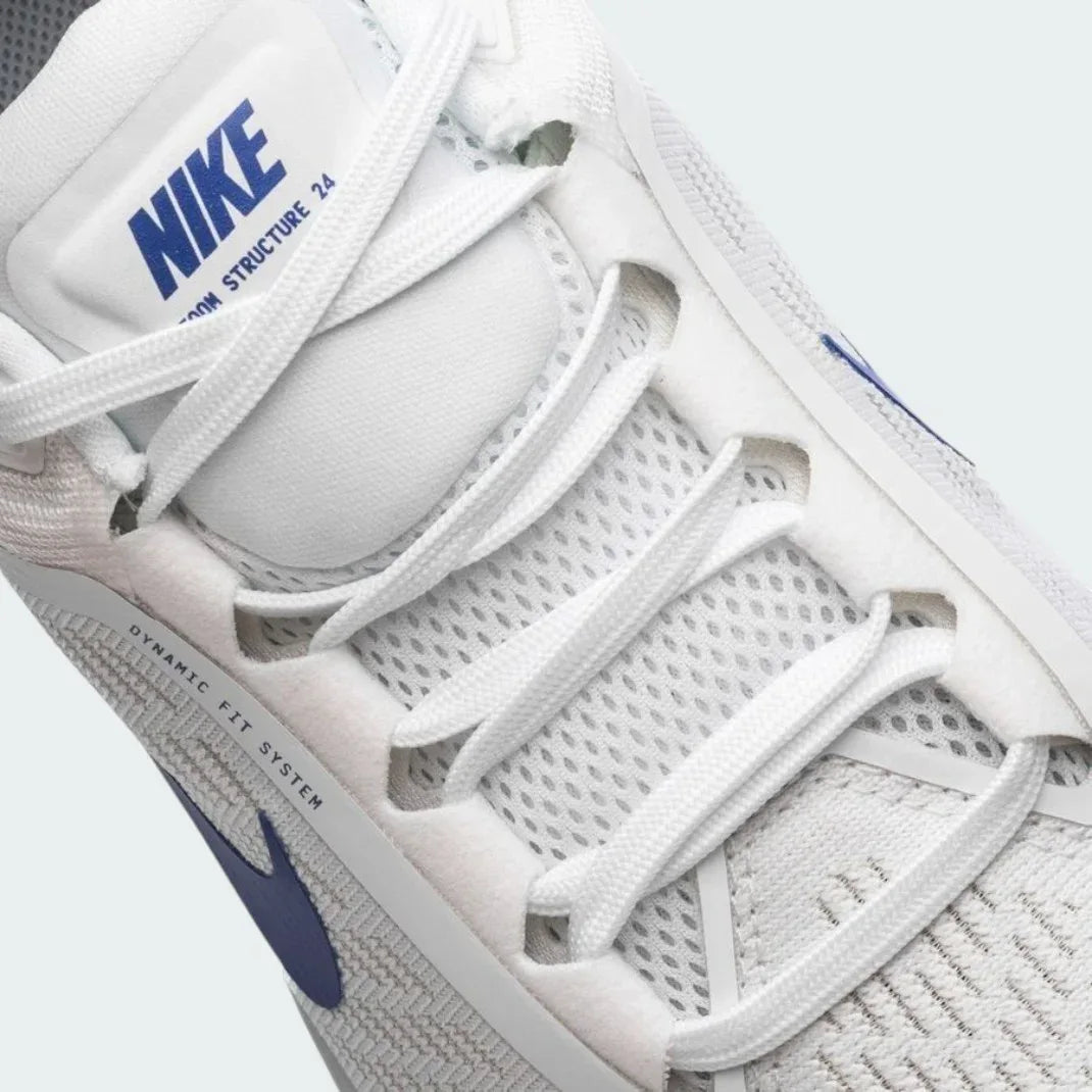 Close-up zoom on the front of the Nike Air Zoom Structure 24 Men's white running shoes, showing the breathable engineered mesh texture and integrated lacing system.
