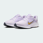 Nike Quest 5 Women's Purple Running Shoes DD9291-500 angled view highlighting sleek running silhouette and responsive foam sole
