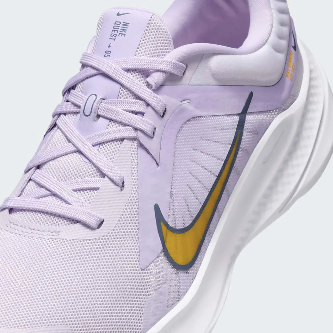 Close-up of Nike Quest 5 Women's Purple Running Shoes DD9291-500 mesh texture, laces, and Nike logo on tongue
