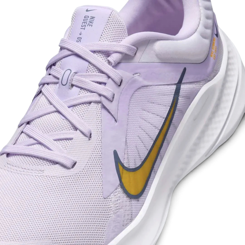 Close-up of Nike Quest 5 Women's Purple Running Shoes DD9291-500 mesh texture, laces, and Nike logo on tongue