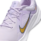 Close-up of Nike Quest 5 Women's Purple Running Shoes DD9291-500 mesh texture, laces, and Nike logo on tongue