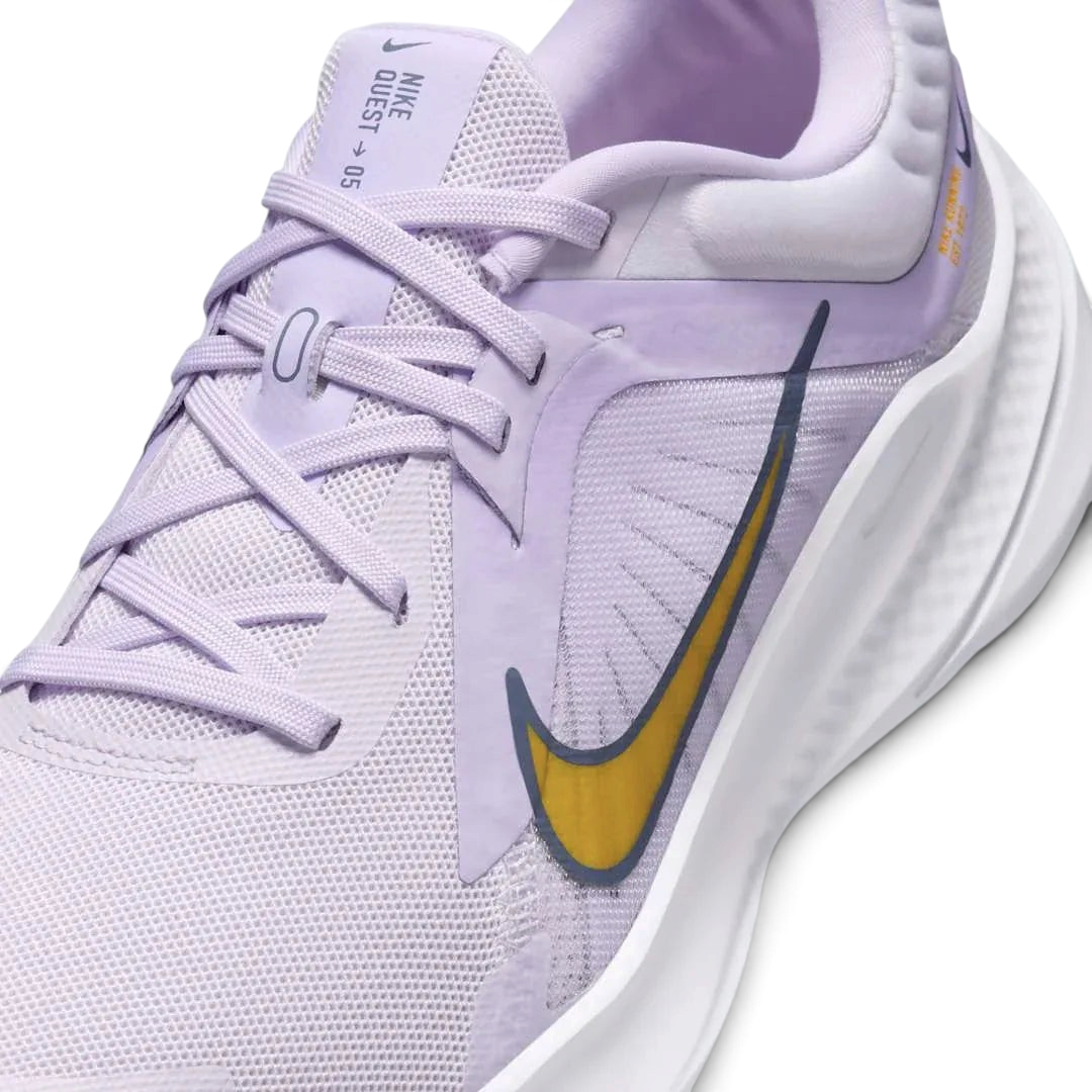 Close-up of Nike Quest 5 Women's Purple Running Shoes DD9291-500 mesh texture, laces, and Nike logo on tongue