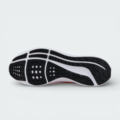 Detailed view of the Nike Air Zoom Pegasus 39 outsole, showing the black rubber waffle tread and orange flex grooves for multi-surface grip.