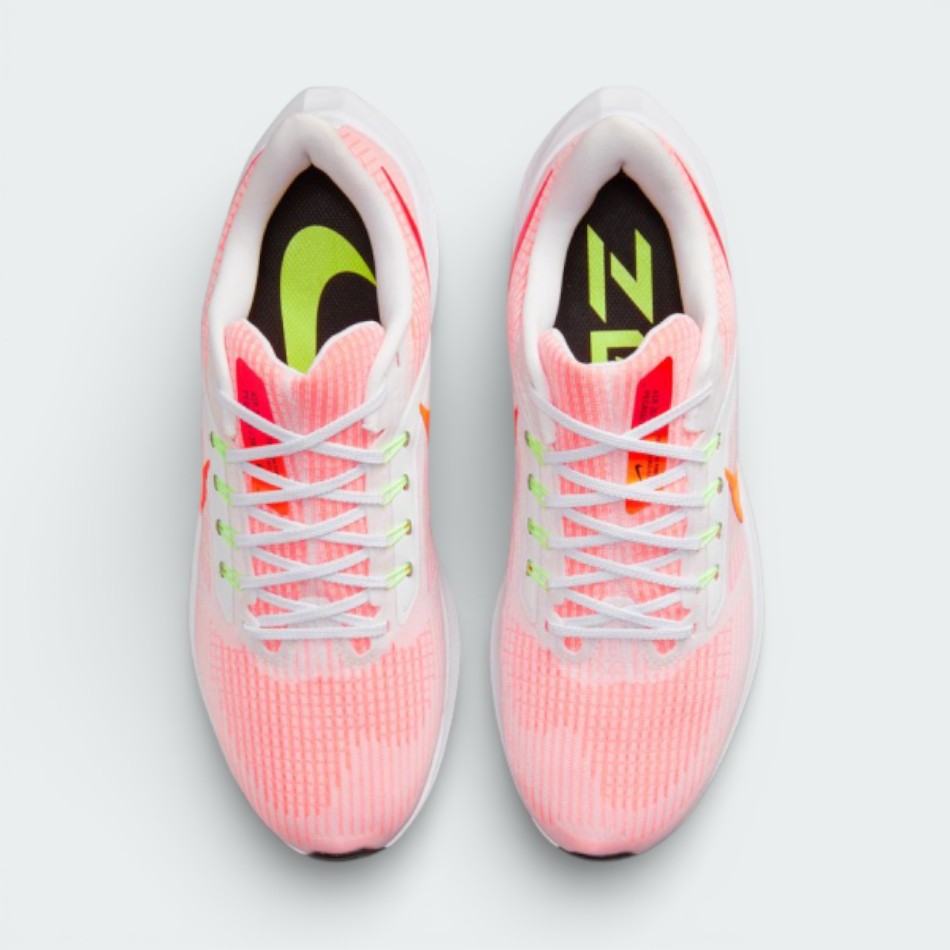 Top-down view of the Nike Air Zoom Pegasus 39 white trainers, highlighting the breathable mesh toe box and the secure Flywire lacing system.