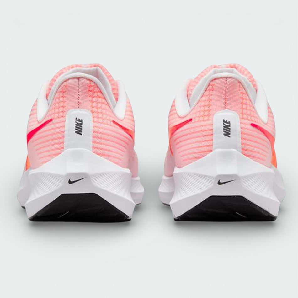 Rear view of the Nike Pegasus 39 focusing on the tapered heel counter and the white foam midsole with orange accents.
