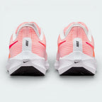 Rear view of the Nike Pegasus 39 focusing on the tapered heel counter and the white foam midsole with orange accents.