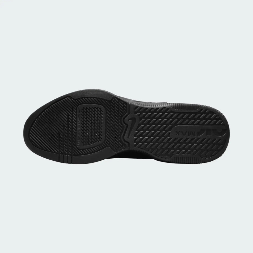View of the outsole of the Nike Air Max Alpha Trainer 5 Men's black, showing the durable rubber tread pattern for multi-directional gym traction.