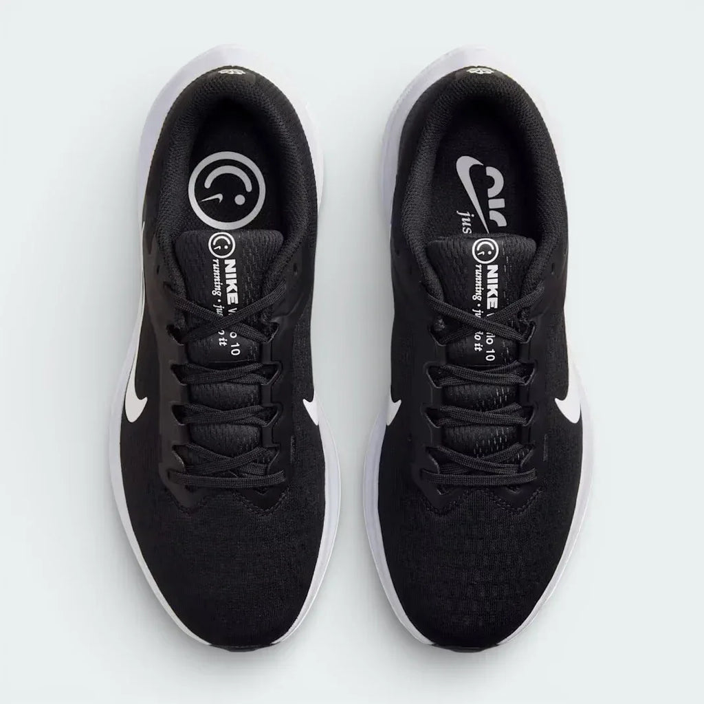 Top-down view of the black Nike Air Winflo 10 trainers, highlighting the sleek lacing system and the breathable mesh texture across the toe box.