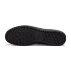 Bottom sole view of the sneaker displaying the black rubber Waffle traction pattern with embedded Nike branding.