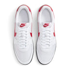 Top-down view of both sneakers placed side by side, highlighting the white textile toe boxes, white laces, and vintage red tongue logos.