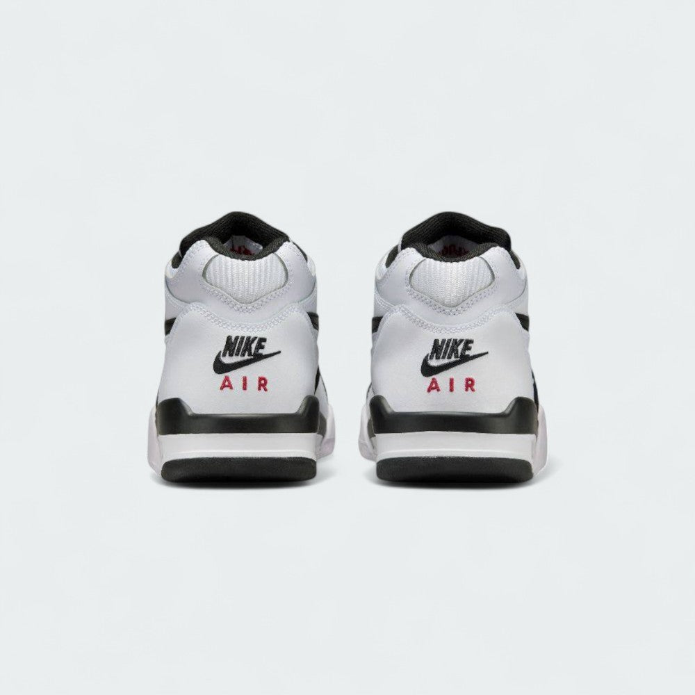 Rear view of the Nike Air Flight 89 Juniors' white basketball trainers, focusing on the padded collar, heel counter, and Nike Air branding.