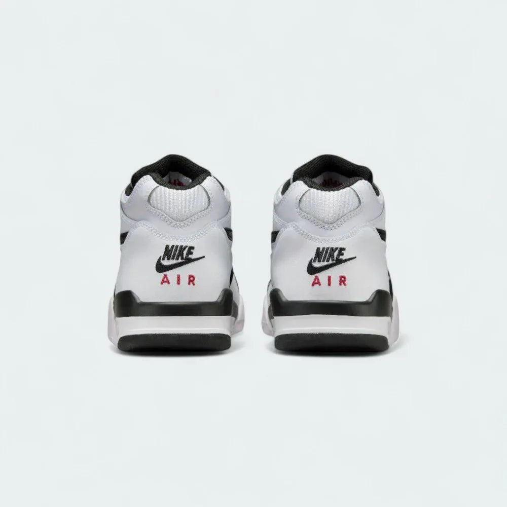Rear view of the Nike Air Flight 89 Juniors' white basketball trainers, focusing on the padded collar, heel counter, and Nike Air branding.