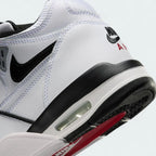 Detailed zoom on the outsole and midsole of the Nike Air Flight 89 Juniors' white basketball trainers, highlighting the visible Air cushioning and durable rubber outsole.