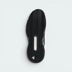 Displays the technical clay herringbone tread matrix designed for unreal grip and controlled sliding on clay courts.