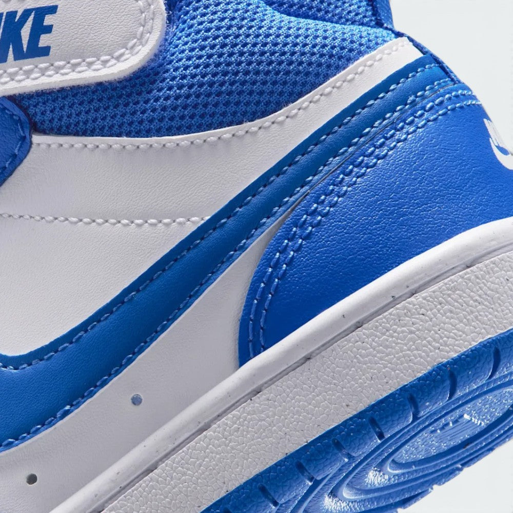Detailed close-up of the lateral rear cupsole, showing the textured white midsole stitching, Blue Crystal heel overlay, and the edge of the blue tread.