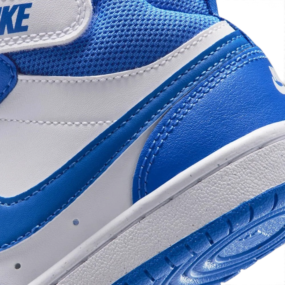 Detailed close-up of the lateral rear cupsole, showing the textured white midsole stitching, Blue Crystal heel overlay, and the edge of the blue tread.