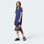 Highlights the high-velocity white adidas 3-Stripes running down the flanks and the professional drape of the regular-fit silhouette.
