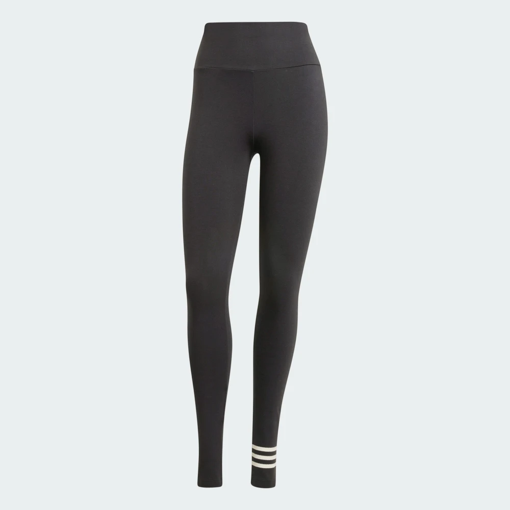 Front view of the black adidas Neuclassics leggings displayed on a plain white background, showcasing the high waistband, full-length slim fit, and asymmetric white 3-Stripes wrapping around the left lower leg.