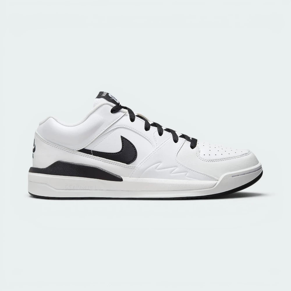Side Profile Image: Highlights the White leather panels, the black swoosh and the Formula 23 foam midsole. Main image