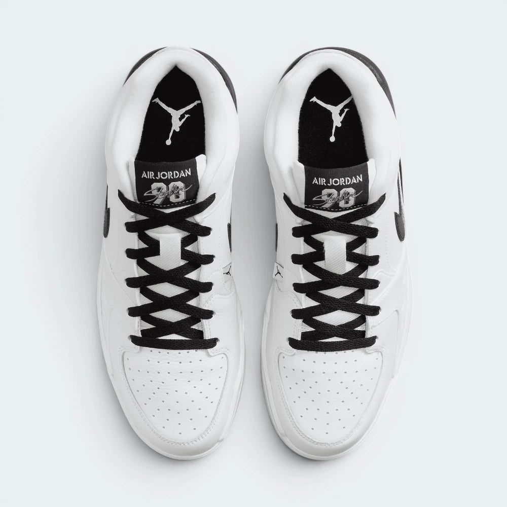 Top-Down View of Pair: Focuses on the premium lacing system and the breathable textile sections of the upper.