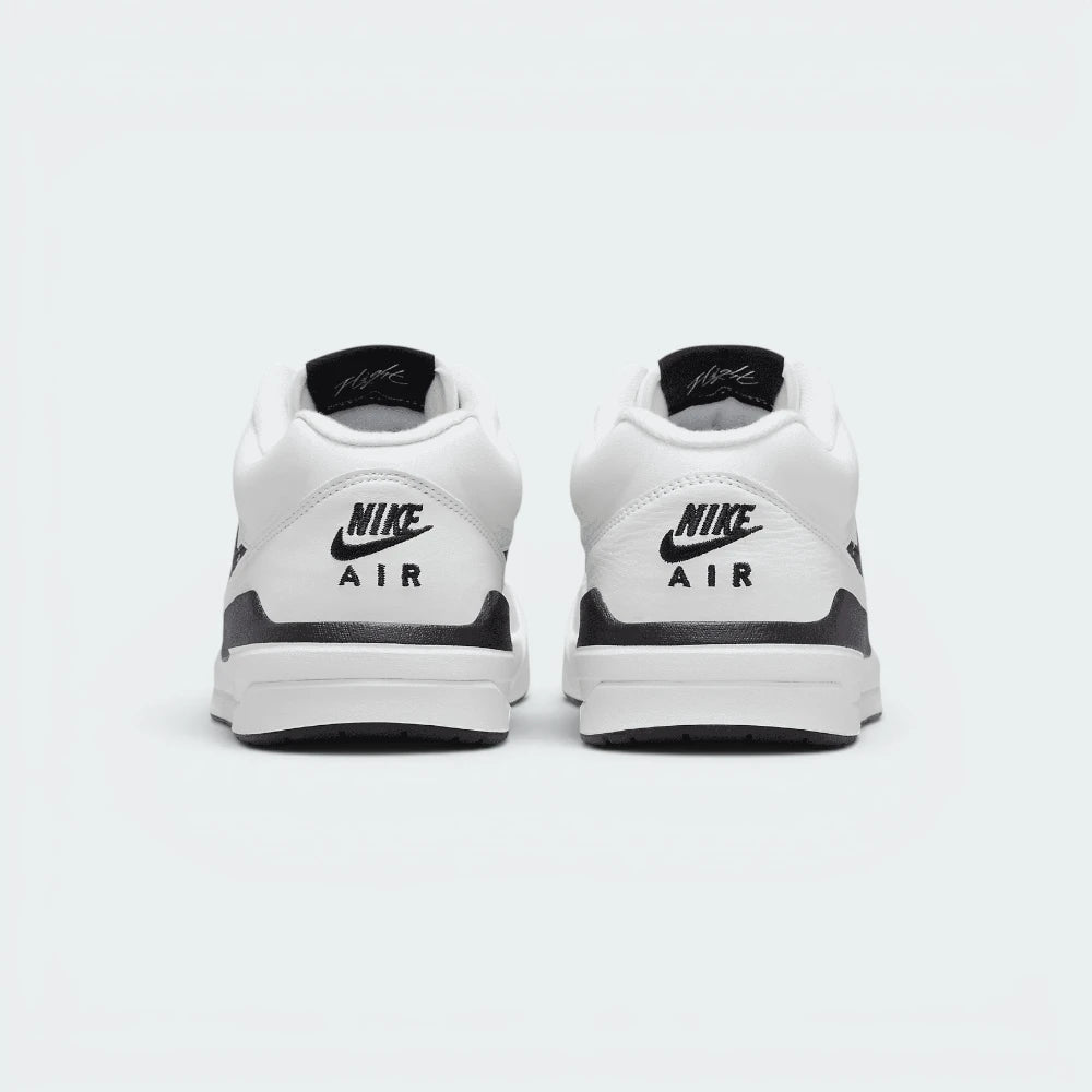 View from Behind Looking at the Heel: Focuses on the "Nike Air" branding and the structured support of the heel counter.