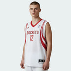 Person wearing a Houston Rockets basketball jersey with the number 12 on a white background