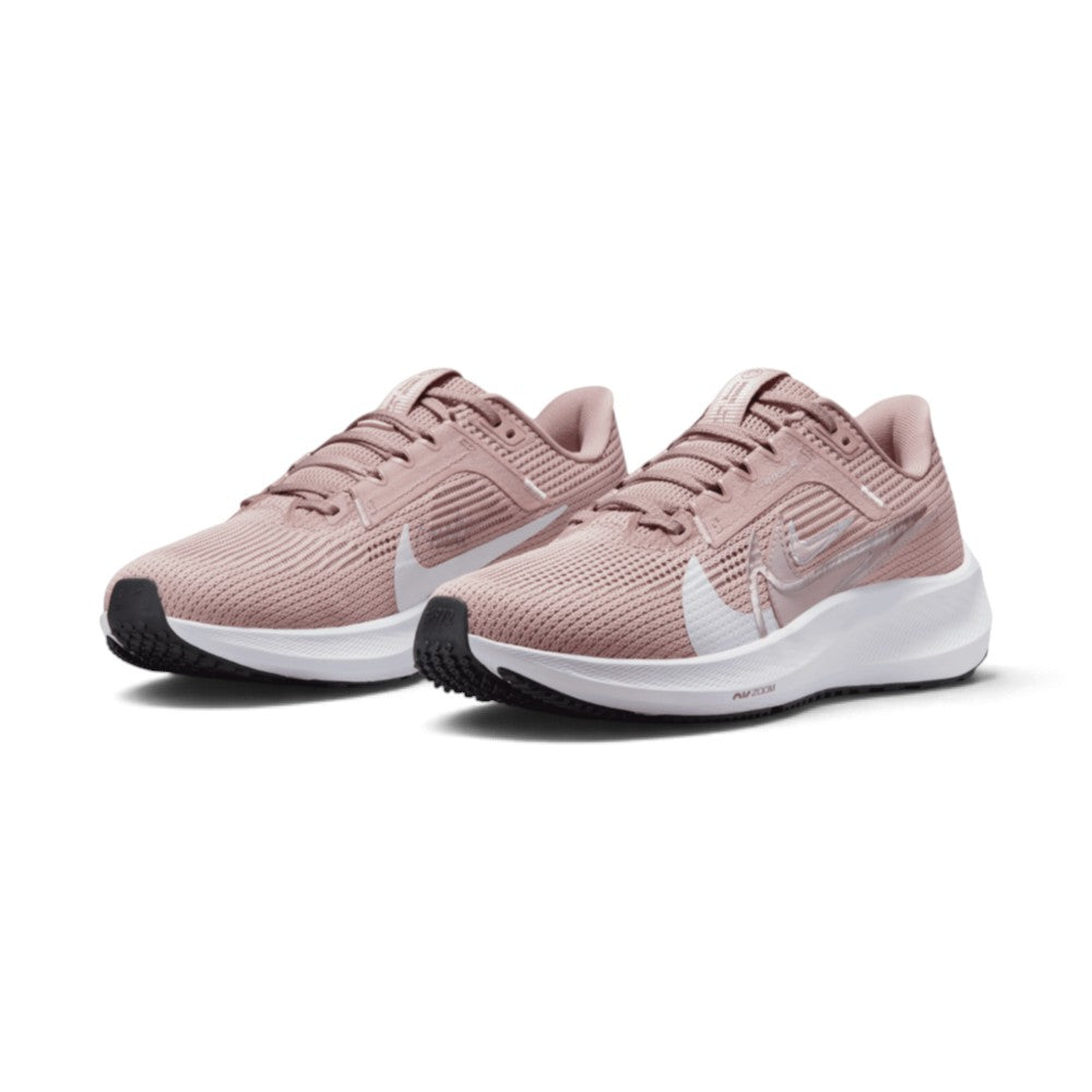 Forward three-quarter angle showcasing both shoes side by side, highlighting the streamlined running stance, premium seasonal colorway, layered side branding, and clean white midsole geometry.